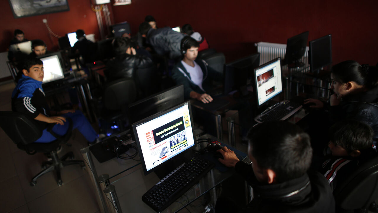 TURKEY-INTERNET/ People use computers at an internet cafe in Ankara February 6, 2014. Turkey's parliament, where Prime Minister Tayyip Erdogan's AK Party has a majority, has approved internet controls enabling web pages to be blocked within hours in what the opposition decried as part of a government bid to stifle a corruption scandal with methods more suitable to "times of coups". Under a bill passed late on Wednesday, telecommunications authorities can block access to material within four hours without a prior court order