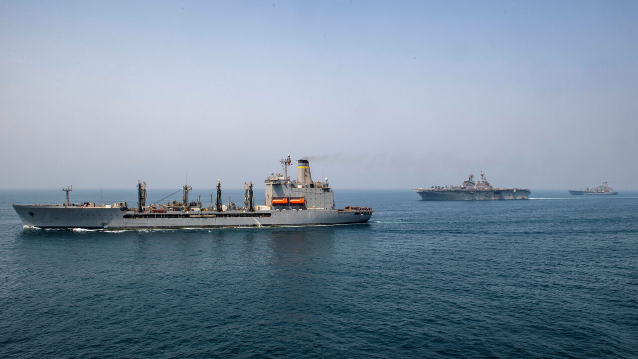 MIDEAST-IRAN/TANKER-USA Fleet replenishment oiler USNS Big Horn (L), amphibious assault ship USS Boxer (C), and fleet replenishment oiler USNS Tippecanoe transit the Arabian Gulf, according to the U.S. Navy in this picture released on July 24, 2019. Kyle Carlstrom/U.S. Navy/Handout via REUTERS ATTENTION EDITORS- THIS IMAGE HAS BEEN SUPPLIED BY A THIRD PARTY. - RC1A0335D650