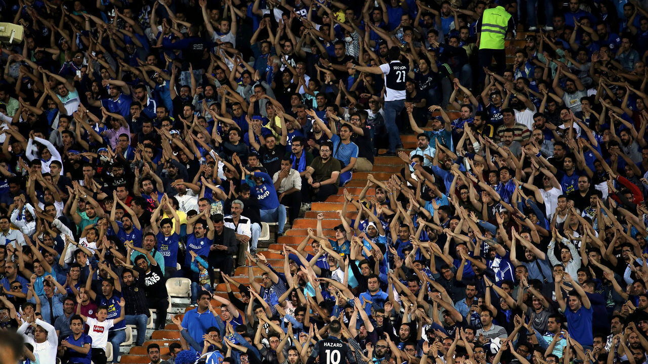 1141682887 Esteghlal supporters attend the AFC Champions League group C football match between Iran's Esteghlal and Qatar's Al Duhail at the Azadi Stadium in Tehran on May 6, 2019. (Photo by ATTA KENARE / AFP) (Photo credit should read ATTA KENARE/AFP/Getty Images)