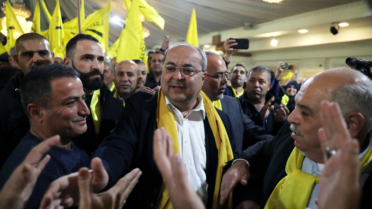 ISRAEL-ELECTION/ARABS Ahmad Tibi, leader of the Ta'al party faction, is surrounded by supporters during an election campaign event in the Wadi Ara, in northern Israel February 2, 2019. Picture taken February 2, 2019. REUTERS/Ammar Awad - RC1BF8975AF0