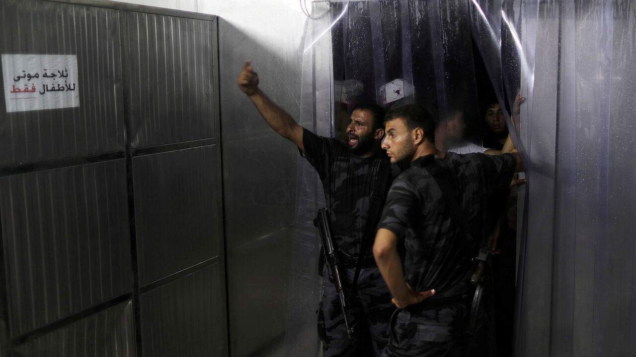 Palestinian Hamas security forces stand guard at the hospital following an explosion in Gaza City Palestinian Hamas security forces stand guard at the hospital following an explosion in Gaza City August 27, 2019. REUTERS/Mohammed Salem TPX IMAGES OF THE DAY - RC13666F2270