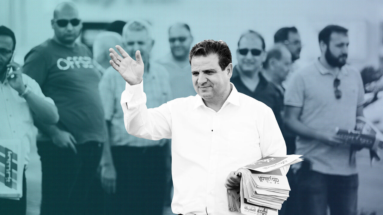 ISRAEL-ELECTION/ARABS Ayman Odeh, leader of the Joint List, gestures as he hands out pamphlets during an an election campaign event in Tira, northern Israel September 5, 2019. Picture taken September 5, 2019. REUTERS/Amir Cohen - RC131423B620