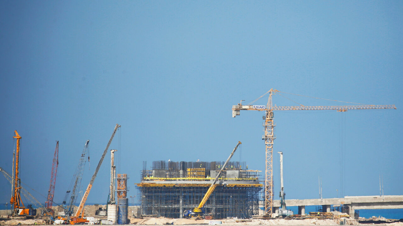 EGYPT-ECONOMY/ A general view shows a construction site of project "New El Alamein" by SIAC, Industrial Construction & Engineering Company at a highway of El Alamein in Egypt, October 23, 2018. REUTERS/Amr Abdallah Dalsh - RC1E93BBF140