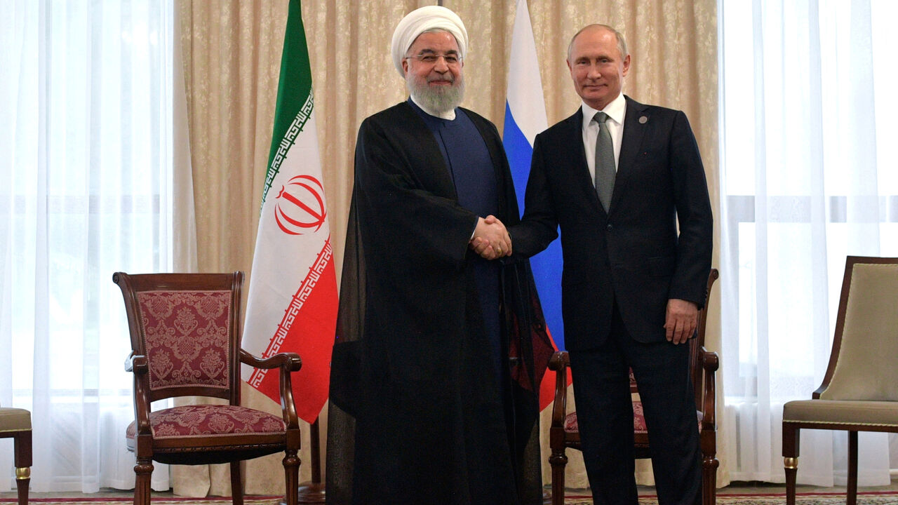 KYRGYZSTAN-SCO/PUTIN-ROUHANI Russia's President Vladimir†Putin†and Iran's President†Hassan†Rouhani attend a meeting on the sidelines of the Shanghai Cooperation Organisation (SCO) summit in Bishkek, Kyrgyzstan June 14, 2019. Sputnik/Alexei Druzhinin/Kremlin via REUTERS ATTENTION EDITORS - THIS IMAGE WAS PROVIDED BY A THIRD PARTY. - RC1D5F7AAE10