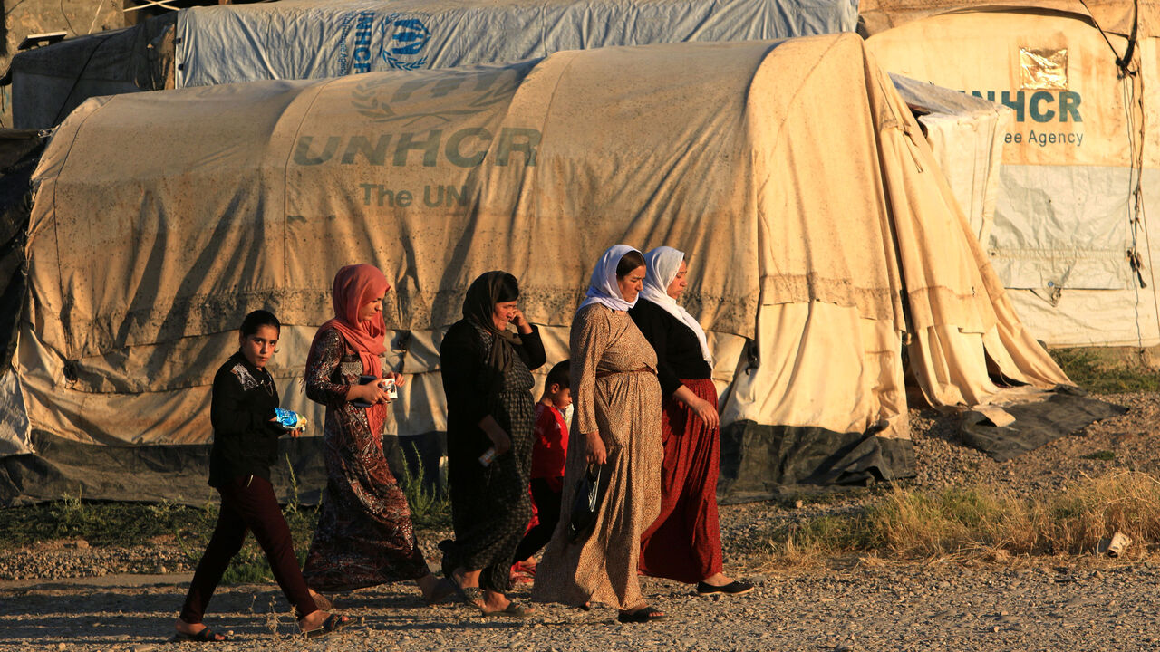IRAQ-YAZIDIS/ANNIVERSARY RTX725J9.jpg