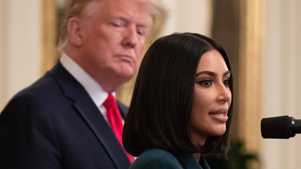 1149699031 Kim Kardashian speaks alongside US President Donald Trump during a second chance hiring and criminal justice reform event in the East Room of the White House in Washington, DC, June 13, 2019. (Photo by SAUL LOEB / AFP) (Photo credit should read SAUL LOEB/AFP/Getty Images)