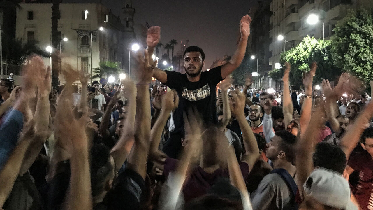 1169917311 21 September 2019, Egypt, Cairo: Protesters shout slogans during a rare anti-government protest in Downtown Cairo. (Best quality available) Photo: Oliver Weiken/dpa (Photo by Oliver Weiken/picture alliance via Getty Images)