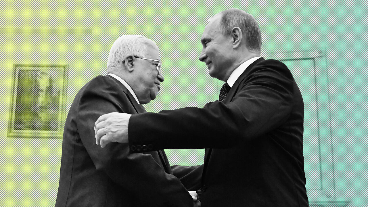 998533466 Russian President Vladimir Putin (R) shakes hands with Palestinian President Mahmud Abbas during their meeting at the Kremlin in Moscow on July 14, 2018. (Photo by Yuri KADOBNOV / AFP) (Photo credit should read YURI KADOBNOV/AFP/Getty Images)