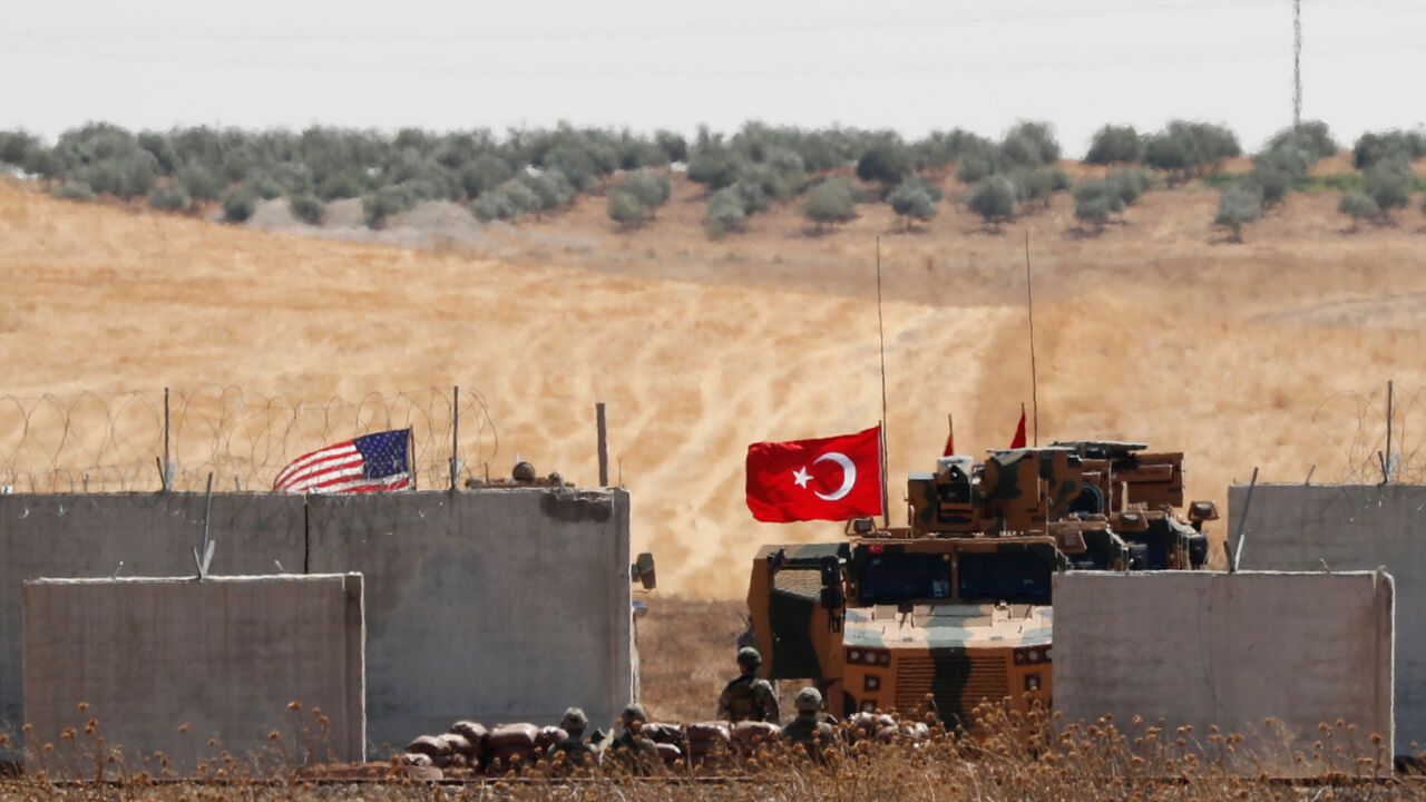 SYRIA-SECURITY/TURKEY-USA Turkish and U.S. troops return from a joint U.S.-Turkey patrol in northern Syria, as it is pictured from near the Turkish town of Akcakale, Turkey, September 8, 2019. REUTERS/Murad Sezer - RC1246867E60