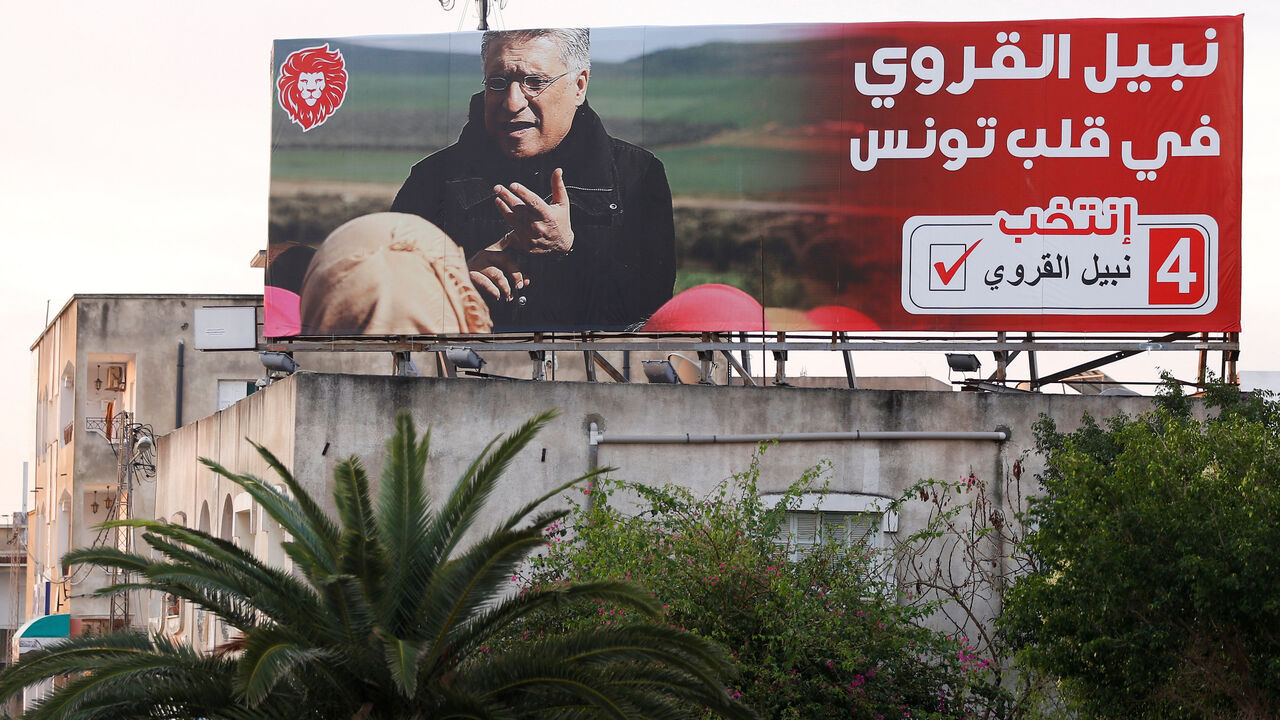 TUNISIA-ELECTION/HUNGERSTRIKE A views shows an election campaign billboard of presidential candidate, Tunisian media mogul Nabil Karoui, in Tunis, Tunisia, September 11, 2019. Picture taken September 11, 2019. REUTERS/Zoubeir Souissi - RC158B0C7260