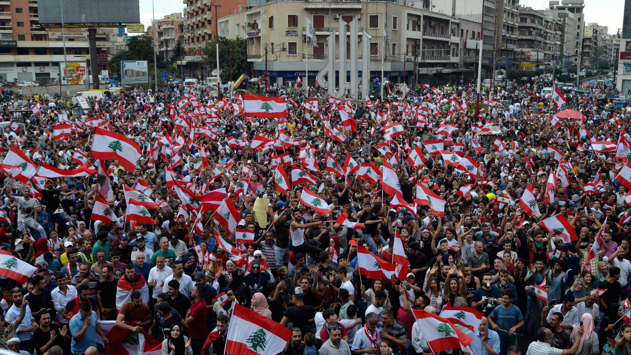LEBANON-PROTESTS/ Demonstrators take part in an anti-government protest in Tripoli, Lebanon October 20, 2019. REUTERS/Omar Ibrahim - RC1AD085BF90