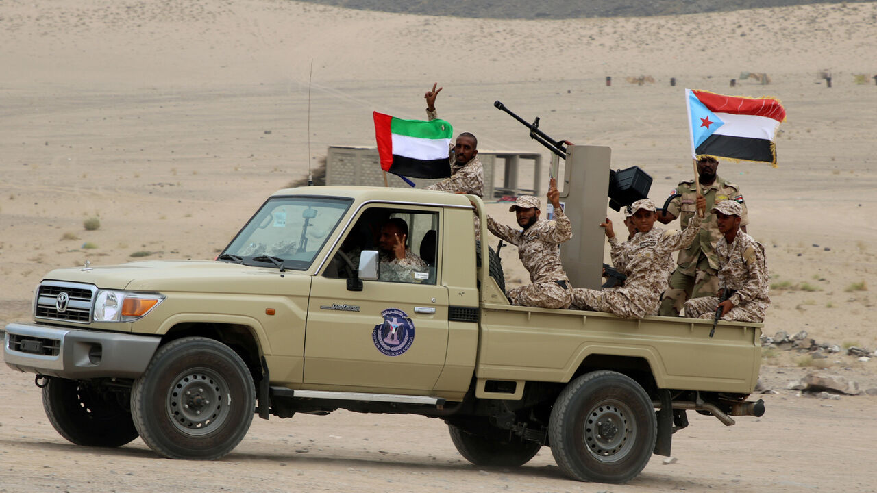 YEMEN-SECURITY/ Newly recruited troops of the UAE-backed separatist Southern Transitional Council are seen on a vehicle during their graduation in Aden, Yemen July 23, 2019. REUTERS/Fawaz Salman - RC1A52E65510