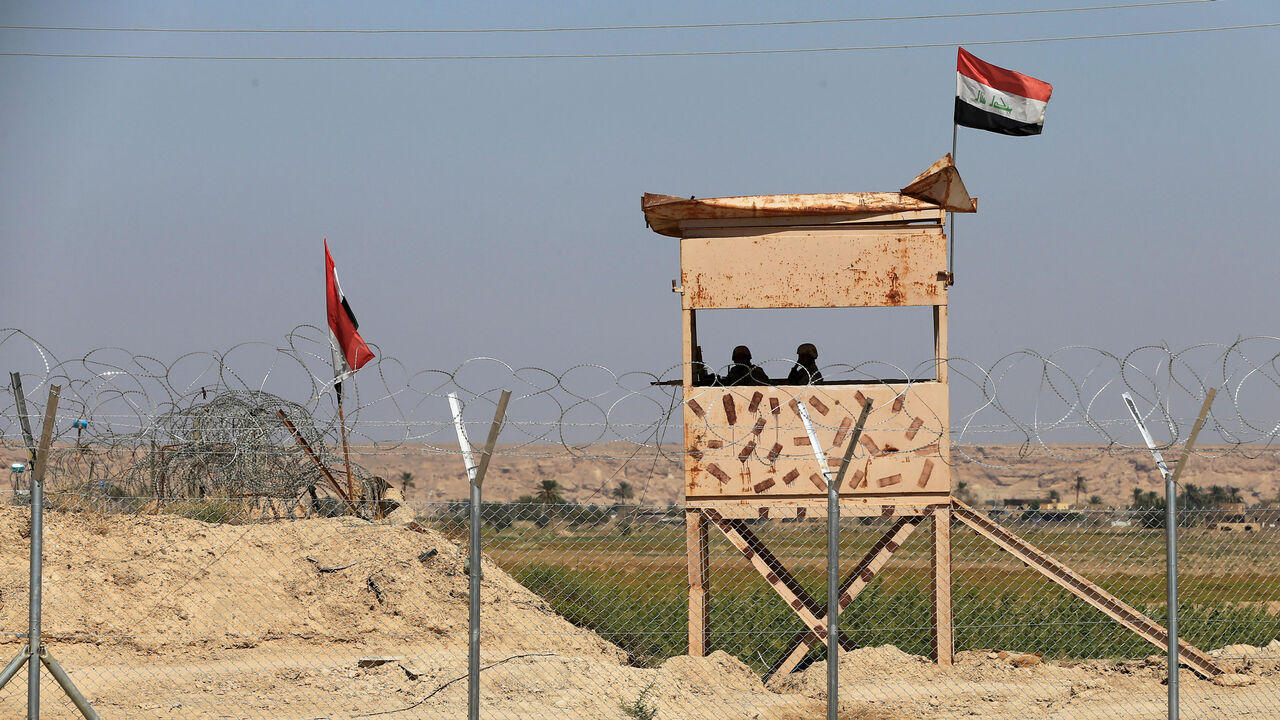 IRAQ-SYRIA/BORDER RTX75C1R.jpg