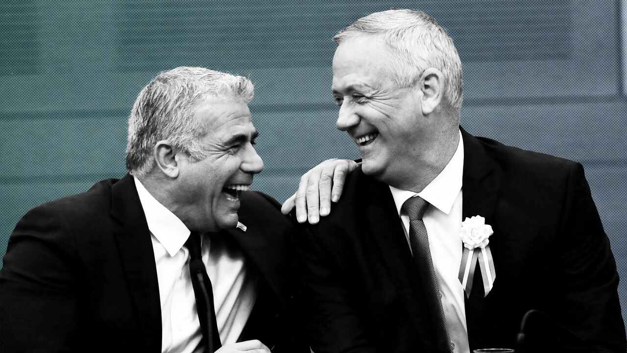 ISRAEL-POLITICS/GANTZ Benny Gantz, leader of Blue and White, and party member Yair Lapid chat during their party faction meeting at the Knesset, Israel's parliament, in Jerusalem October 3, 2019. REUTERS/Ronen Zvulun - RC19B4385D20