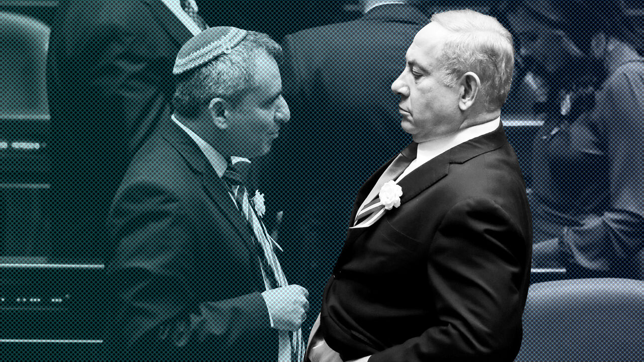 Israeli Prime Minister Benjamin Netanyahu speaks with member of the Knesset for Likud Zeev Elkin as they attend the swearing-in ceremony of the 22nd Knesset, the Israeli parliament, in Jerusalem October 3, 2019. REUTERS/Ronen Zvulun - RC1F058B5430