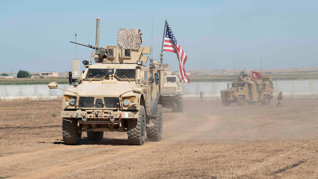 SYRIA-SECURITY/TURKEY-USA-TRUMP U.S. and Turkish military forces conduct a joint ground patrol inside the security mechanism area in northeast, Syria, September 8, 2019. Picture taken September 8, 2019. U.S. Army/Spc. Alec Dionne/Handout via REUTERS. THIS IMAGE HAS BEEN SUPPLIED BY A THIRD PARTY. TPX IMAGES OF THE DAY - RC1A2BD04270