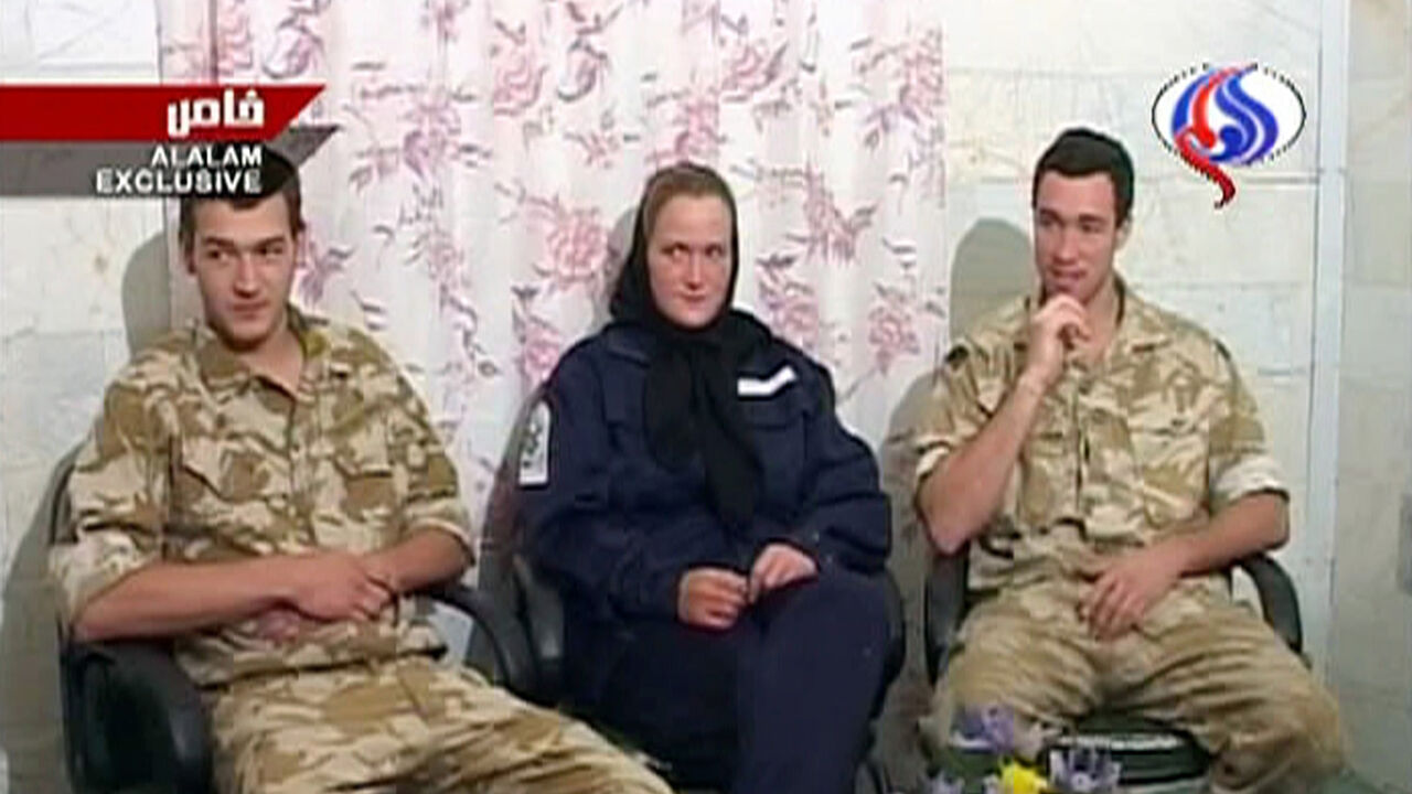 IRAN-BRITAIN/ A frame grab from Iranian TV shows three of 15 captured British sailors and marines speaking on Iranian television March 30, 2007. Iranian television broadcast the footage of the three on Friday and said one had confessed to entering Iranian waters illegally and had apologised to the Iranian people. REUTERS/Al Alam Television (IRAN) IRAN OUT - GM1DUXVBCMAA