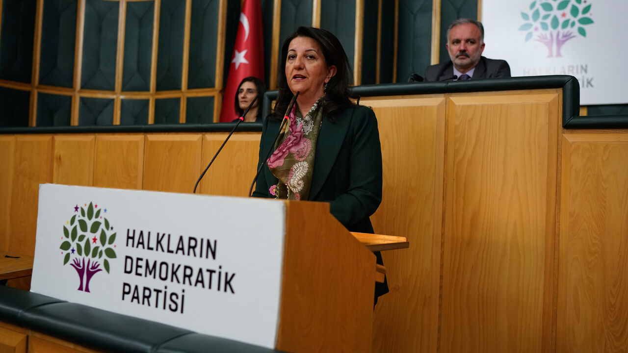 TURKEY-KURDS/ Pervin Buldan, co-leader of the pro-Kurdish Peoples' Democratic Party (HDP), speaks before starting a two-day hunger strike in support of jailed Kurdish lawmaker Leyla Guven's own hunger strike against the isolation of Kurdish rebel leader Abdullah Ocalan in prison, at the Turkish Parliament in Ankara, Turkey December 4, 2018. REUTERS/Umit Bektas - RC17525CE770