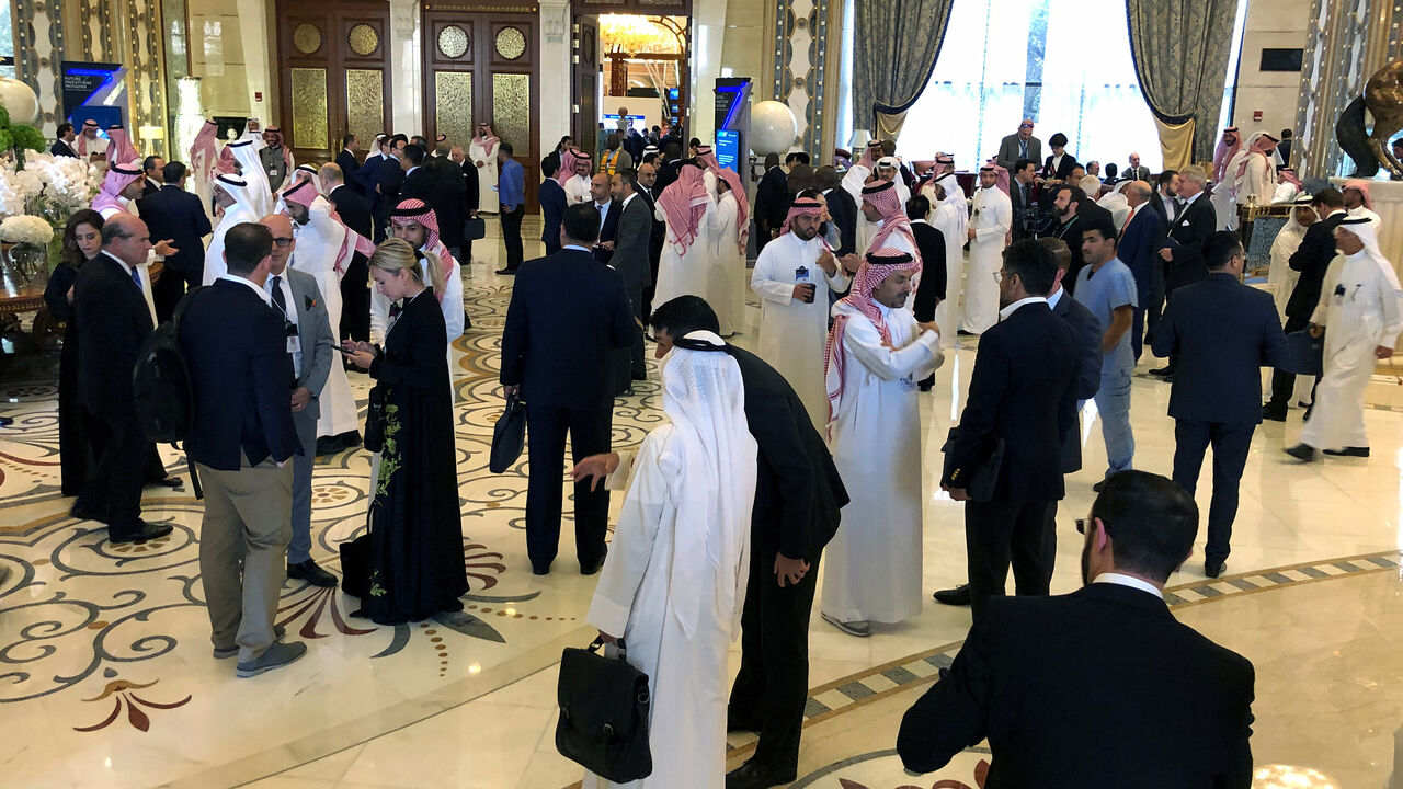 SAUDI-INVESTMENT/ Participants take a break during the Future Investment Initiative conference in Riyadh, Saudi Arabia, October 30, 2019. REUTERS/Hamad I Mohammed - RC1CBAA19E30