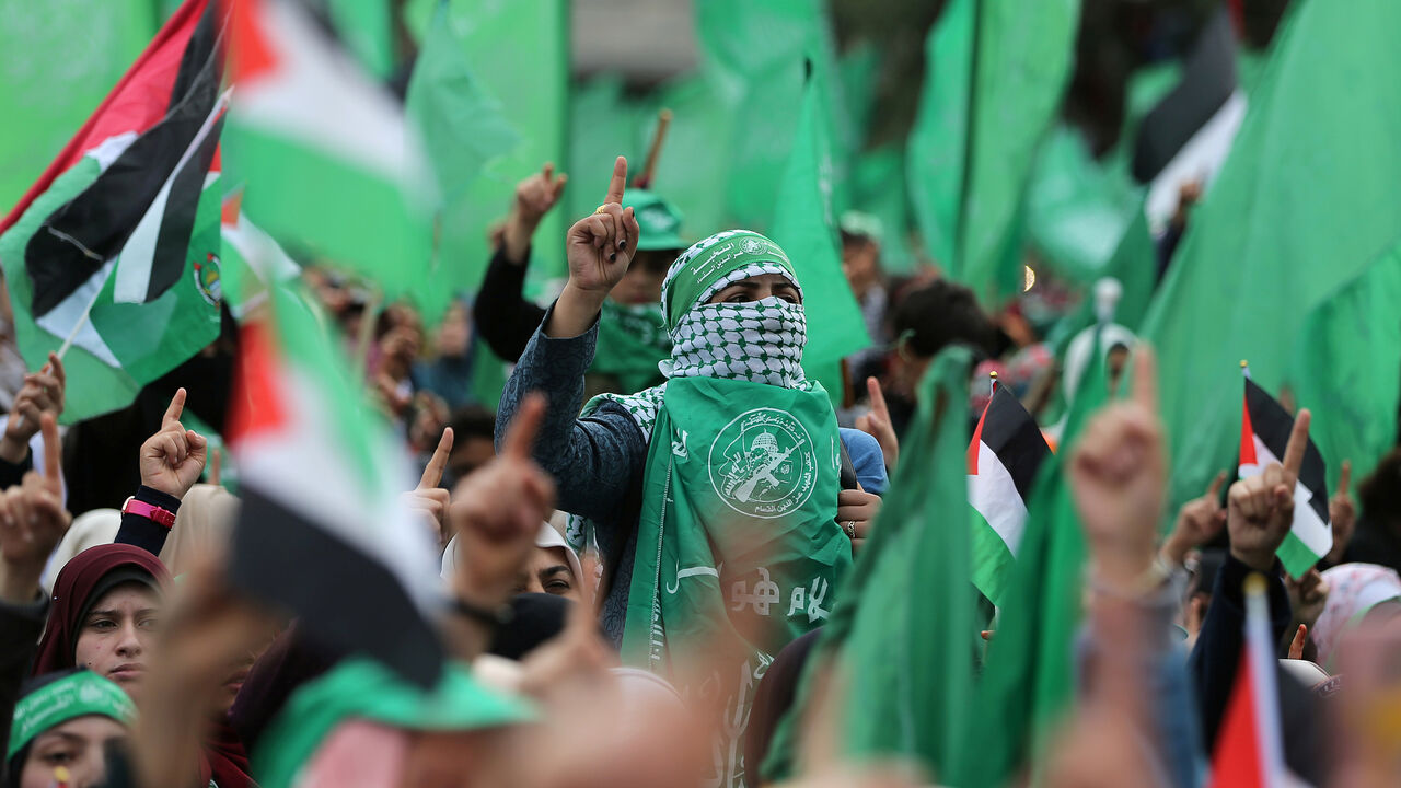 Palestinians take part in a rally marking the 31st anniversary of Hamas' founding, in Gaza City December 16, 2018. REUTERS/Ibraheem Abu Mustafa - RC1AF0B233A0
