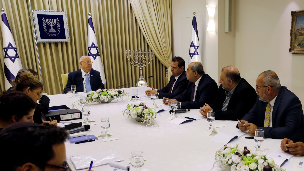 ISRAEL-ELECTION/ Memebers of the Joint List party, sits next to Israeli President Reuven Rivlin as he began talks with political parties over who should form a new government, at his residence in Jerusalem September 22, 2019. Menachen Kahana/Pool via REUTERS - RC1545ABB3C0