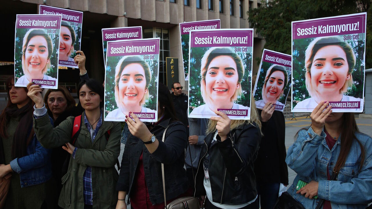 1059109230 Women protest femicide before the trial regarding the death of Sule Cet, who was allegedly killed by being thrown off the 20th floor of a luxury building in Ankara, on November 8, 2018. (Photo by ADEM ALTAN / AFP) (Photo credit should read ADEM ALTAN/AFP via Getty Images)