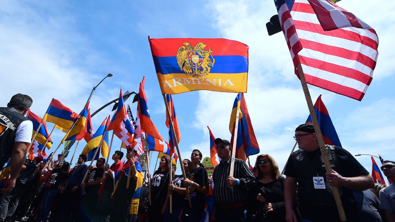 950858906 Armenian-Americans march in protest through the Little Armenia neighborhood of Hollywood, California on April 24, 2018 demanding recognition by Turkey on the 103rd anniversary of the 1915 Armenian genocide, which Turkey insists did not happen. (Photo by FREDERIC J. BROWN / AFP) (Photo credit should read FREDERIC J. BROWN/AFP via Getty Images)