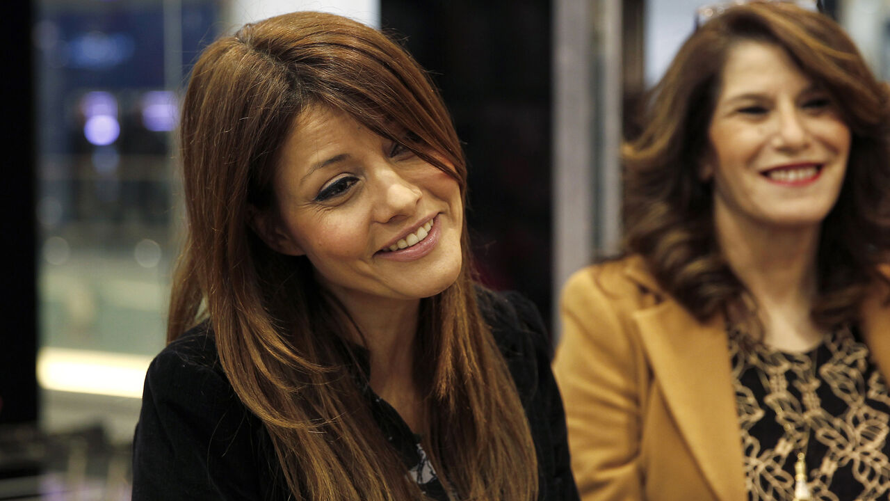 ISRAEL-ELECTION/WOMEN Israeli legislator Orly Levy-Abeksis (L) campaigns at a shopping mall in the town of Beit Shemesh near Jerusalem February 22, 2015. Whether on the left, in the centre or on the right of the spectrum, women are filling senior positions in Israel's major parties, influencing the style, tone and manner of politics, even if it remains a tough-talking game. One of the most prominent is Levy-Abeksis, number two on the list for Yisrael Beitenu, a far-right nationalist party that is expected to win 5 or 6 seats in