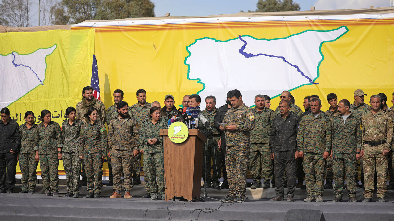 MIDEAST-CRISIS/ISLAMIC STATE-SDF Mazloum Kobani, Syrian Democratic Forces' (SDF) commander in chief, talks as he announces the destruction of Islamic State's control of land in eastern Syria, at al-Omar oil field in Deir Al Zor, Syria March 23, 2019. - RC1F71152EF0