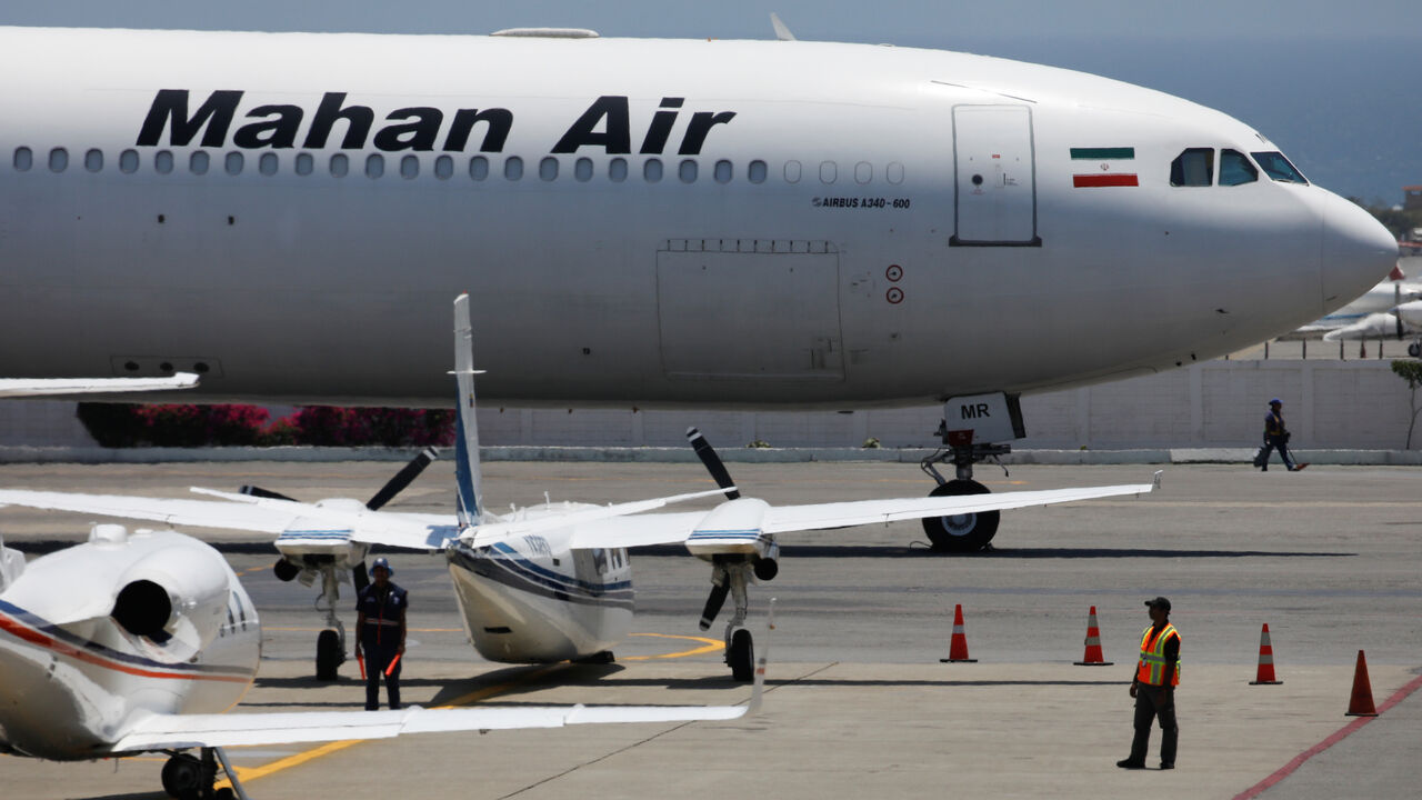 IRAN-VENEZUELA/AIRLINES An Airbus A340-600 airplane of Mahan Air is seen at Simon Bolivar International Airport outside Caracas, Venezuela April 8, 2019. REUTERS/Carlos Garcia Rawlins - RC1E1A8BA0C0