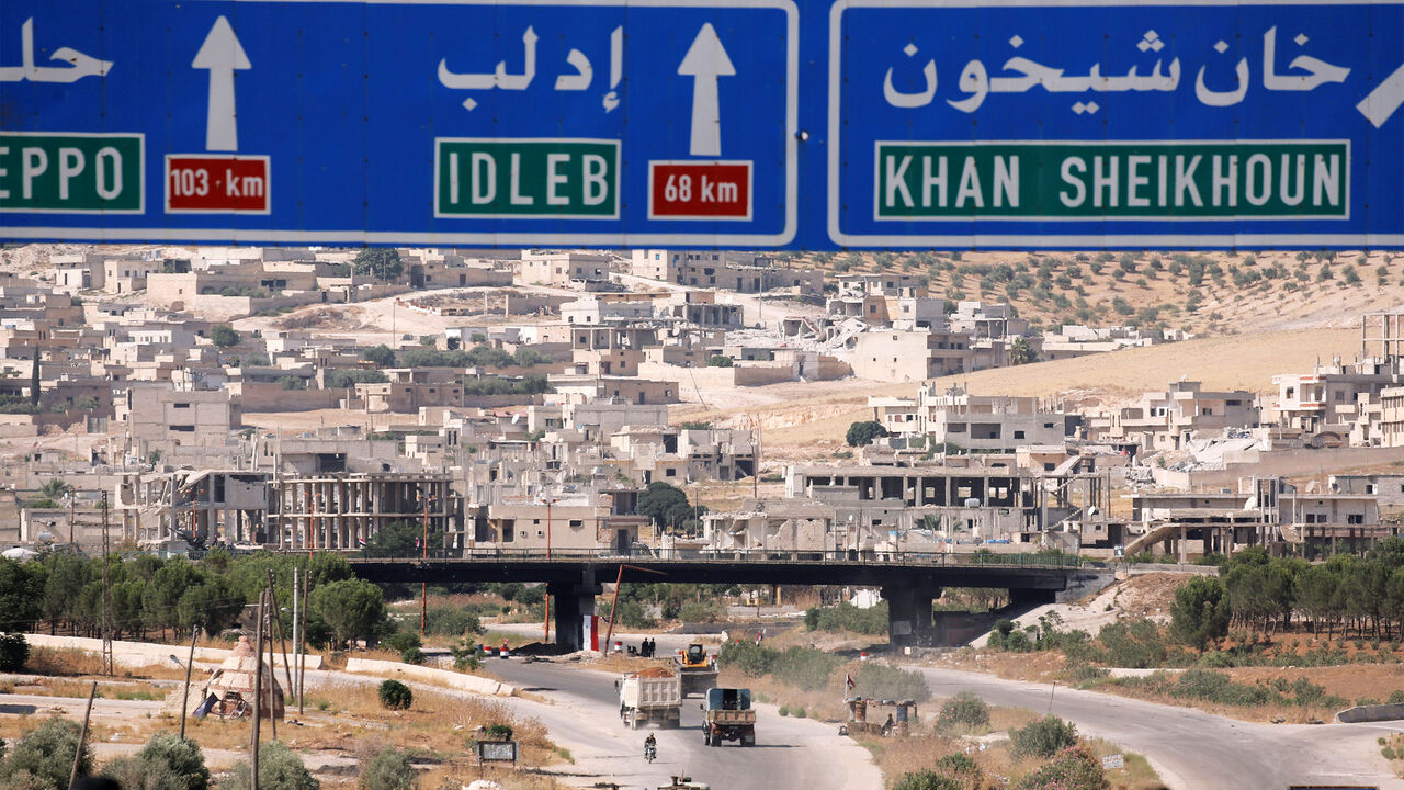 Road direction signs are pictured at the entrance enroute to Khan Sheikhoun, Idlib, Syria August 24, 2019. REUTERS/Omar Sanadiki - RC18F81DAAE0