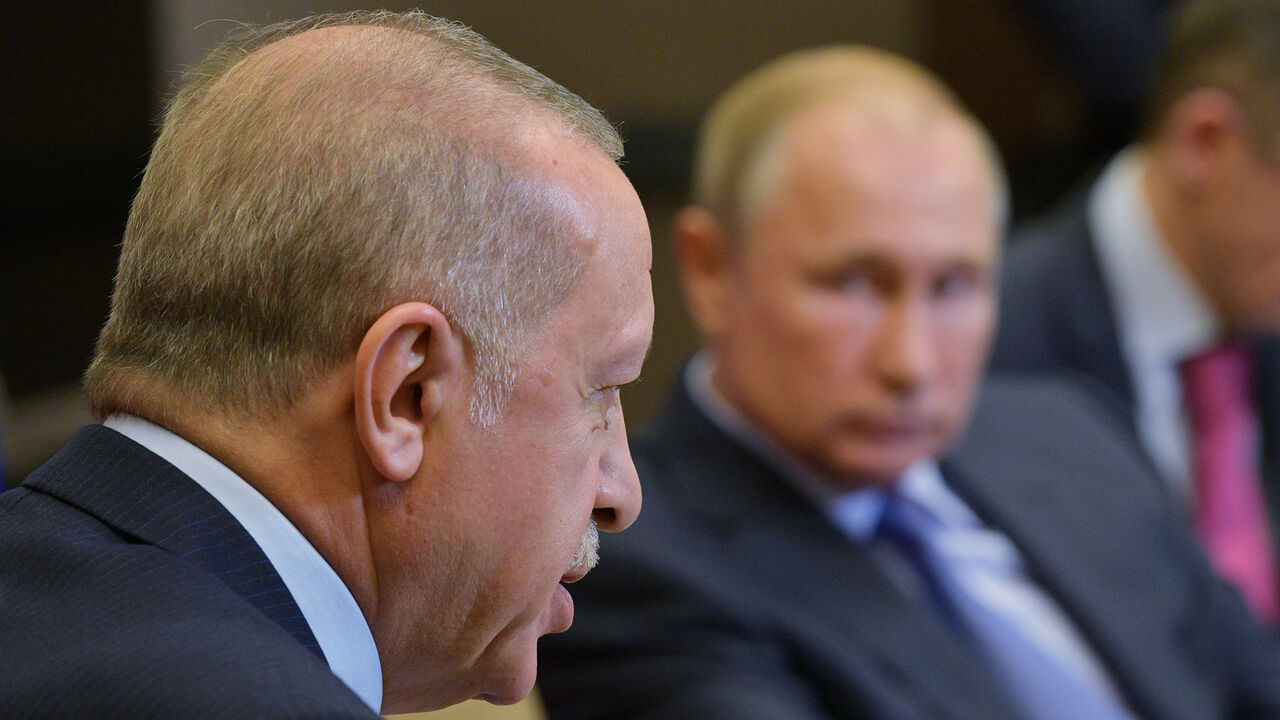SYRIA-SECURITY/RUSSIA-TURKEY-TALKS Turkish President Tayyip Erdogan speaks during a meeting with Russian President Vladimir Putin in Sochi, Russia October 22, 2019. Sputnik/Alexei Druzhinin/Kremlin via REUTERS ATTENTION EDITORS - THIS IMAGE WAS PROVIDED BY A THIRD PARTY. - RC11687C0E70