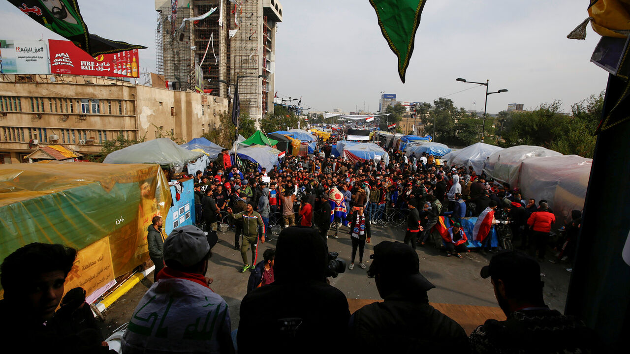 Iraqi demonstrators take part at the ongoing anti-government protests, in Baghdad, Iraq, December 10, 2019. REUTERS/Alaa al-Marjani - RC2BSD9HE2SO