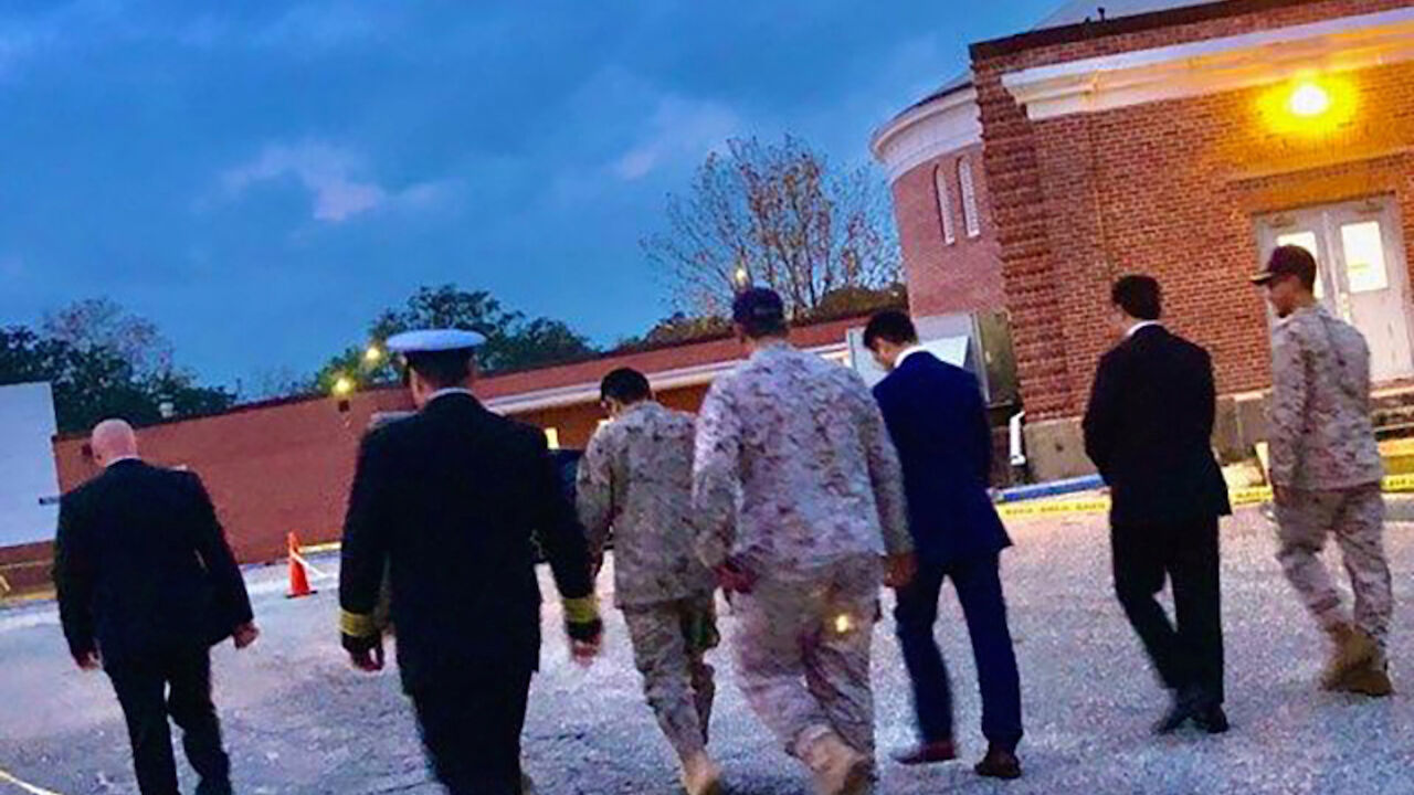 FLORIDA-SHOOTING/ Saudi Arabia Defense Attache Major General Fawaz Al Fawaz and his Embassy staff and other officials arrive to meet with the Saudi students who remain restricted to the Naval Air Station (NAS) Pensacola base by their Saudi commanding officer, in Pensacola, Florida, U.S. December 9, 2019. Picture taken December 9, 2019. FBI Jacksonville/Handout via REUTERS THIS IMAGE HAS BEEN SUPPLIED BY A THIRD PARTY. - RC2ISD9F1TE0
