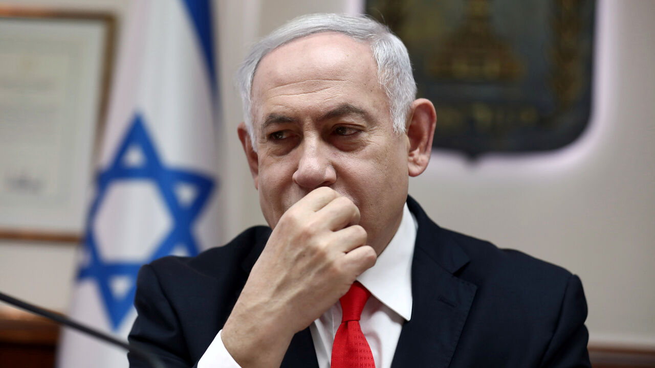 ISRAEL-POLITICS/ Israeli Prime Minister Benjamin Netanyahu looks on as he chairs the weekly cabinet meeting at his Jerusalem office December 15, 2019. Gali Tibbon/Pool via REUTERS - RC2MVD9F1YP9