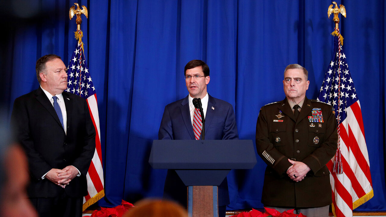 IRAQ-SECURITY/USA U.S. Defense Secretary Mark Esper speaks about airstrikes by the U.S. military in Iraq and Syria, at the Mar-a-Lago resort in Palm Beach, Florida, U.S., December 29, 2019. With him are U.S. Army General Mark Milley and U.S. Secretary of State Mike Pompeo. REUTERS/Tom Brenner - RC2C5E9P88JE