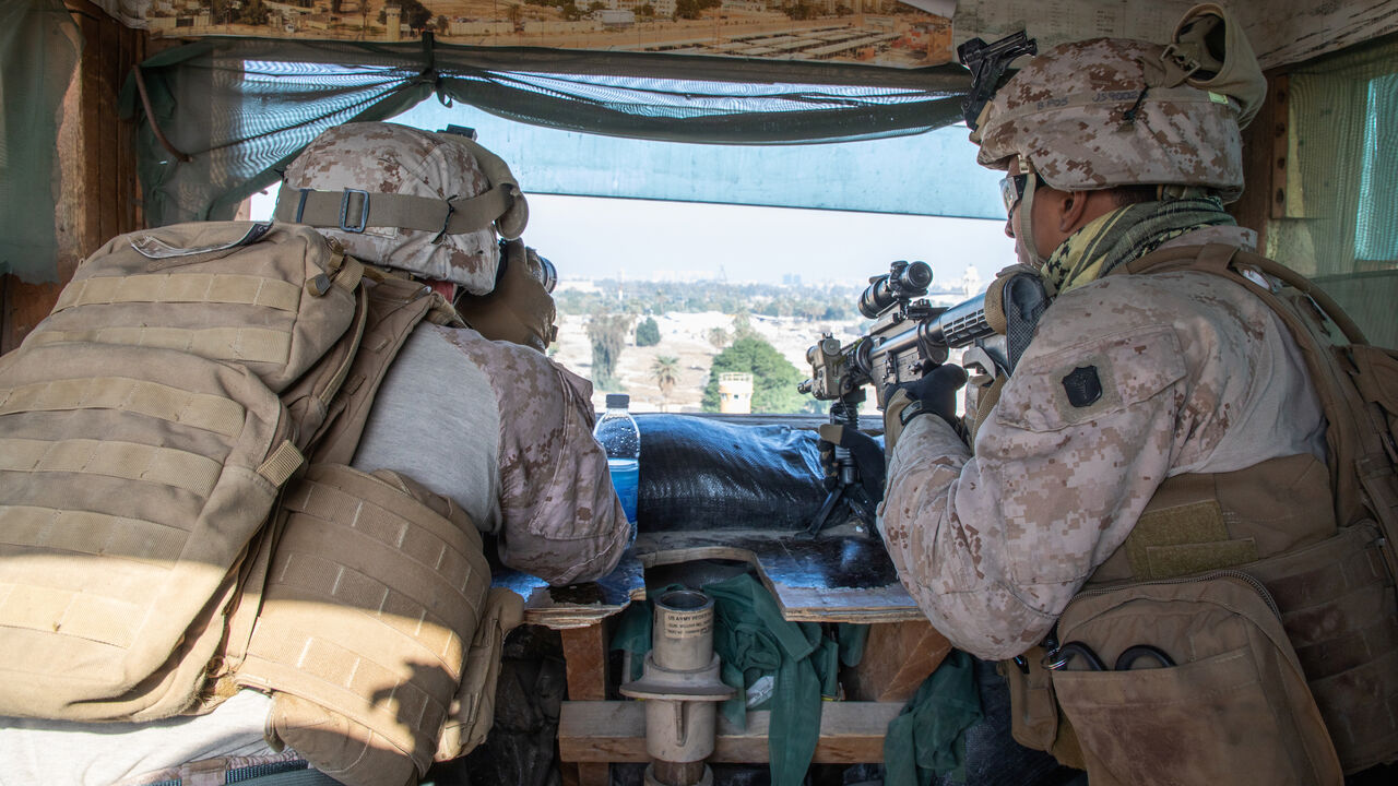 IRAQ-SECURITY/USA U.S. Marines with 2nd Battalion, 7th Marines, assigned to the Special Purpose Marine Air-Ground Task Force-Crisis Response-Central Command (SPMAGTF-CR-CC) 19.2, reinforce the U.S. embassy compound in Baghdad, Iraq, January 3, 2020. U.S. Marine Corps/Sgt. Kyle C. Talbot/Handout via REUTERS. ATTENTION EDITORS - THIS IMAGE HAS BEEN SUPPLIED BY A THIRD PARTY. - RC2H8E91F118