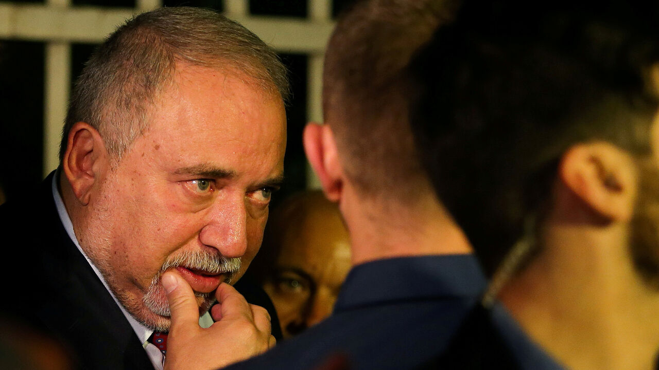 ISRAEL-ELECTION/EXPLAINER FILE PHOTO: Avigdor Lieberman, leader of Yisrael Beitenu leaves his party headquarters following the announcement of exit polls in Israel's parliamentary election, in Jerusalem September 18, 2019. REUTERS/Oren Ben Hakoon/File Photo. ISRAEL OUT. NO COMMERCIAL OR EDITORIAL SALES IN ISRAEL - RC12937027A0