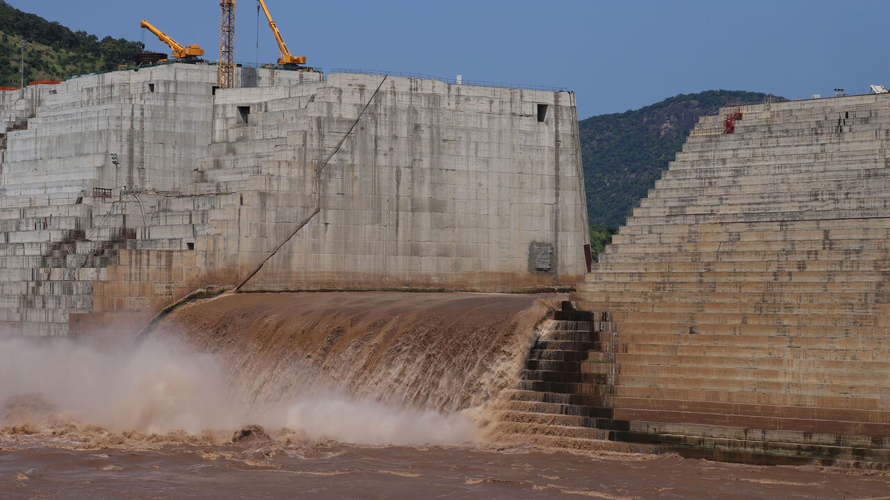 Water flows through Ethiopia's Grand Renaissance Dam as it undergoes construction work on the river Nile in Guba Woreda, Benishangul Gumuz Region, Ethiopia September 26, 2019. Picture taken September 26, 2019. REUTERS/Tiksa Negeri - RC18957504D0