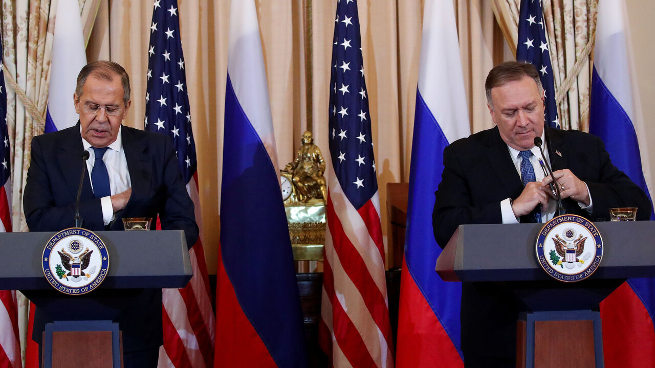 USA-RUSSIA/ Russiaís Foreign Minister Sergey Lavrov and U.S. Secretary of State Mike Pompeo hold a joint news conference at the State Department in Washington, U.S., December 10, 2019. REUTERS/Jonathan Ernst - RC2JSD9HZS8W