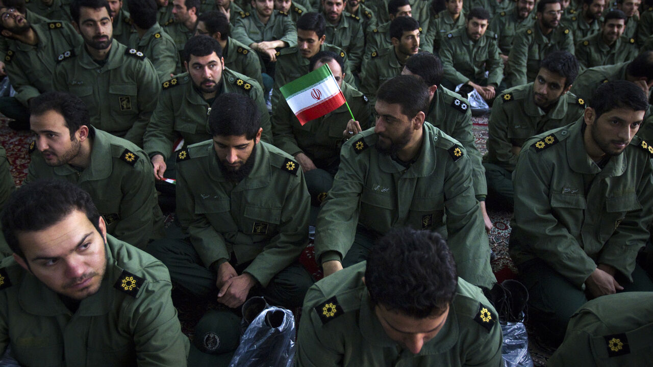 IRAN/ EDITORS' NOTE: Reuters and other foreign media are subject to Iranian restrictions on leaving the office to report, film or take pictures in Tehran.
Members of the revolutionary guard attend the anniversary ceremony of Iran's Islamic Revolution at the Khomeini shrine in the Behesht Zahra cemetery, south of Tehran, February 1, 2012. REUTERS/Raheb Homavandi (IRAN - Tags: POLITICS ANNIVERSARY MILITARY) - GM1E8211G4U01