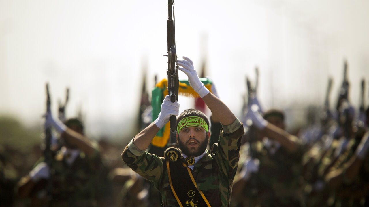 IRAN-PROPAGANDA/ EDITORS' NOTE: Reuters and other foreign media are subject to Iranian restrictions on their ability to report, film or take pictures in Tehran.
Members of Iran's Basij militia march during a parade to commemorate the anniversary of the Iran-Iraq war (1980-88), in Tehran September 22, 2010. Iranian leaders hoping to lift morale at a time of rising prices, food shortages and threats of attack from Israel, are drawing on memories of another era when people united against a common foe: Saddam Hussein's Iraq. P