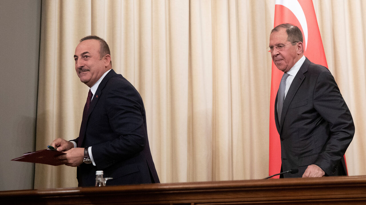 LIBYA-SECURITY/RUSSIA-TURKEY Turkish Foreign Minister Mevlut Cavusoglu and Russian Foreign Minister Sergei Lavrov leave a joint news conference following their talks in Moscow, Russia January 13, 2020. Pavel Golovkin/Pool via REUTERS - RC24FE9RU9P6