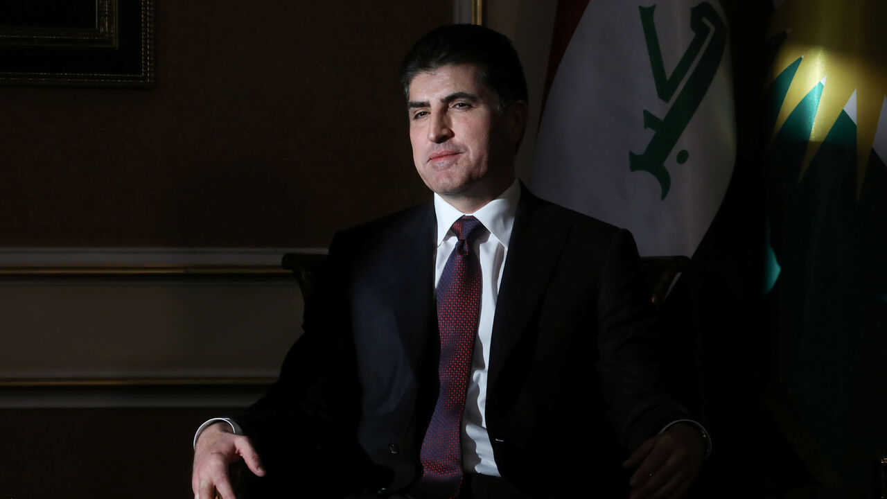 President of the Kurdistan region in Iraq Nechirvan Barzani sits in a shaft of window light as he greets U.S. Vice President Mike Pence in the VIP terminal at Erbil International Airport in Erbil, Iraq November 23, 2019. REUTERS/Jonathan Ernst - RC23HD91WQR6
