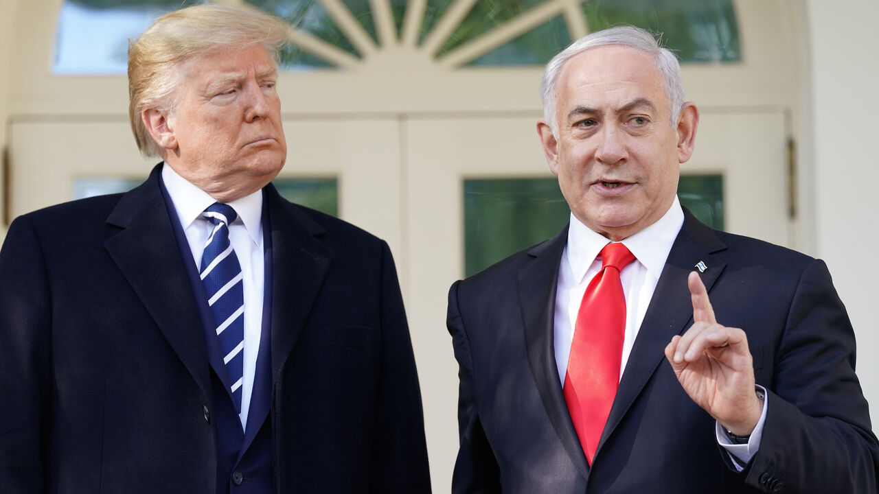 USA-ISRAEL/ U.S. President Donald Trump listens as he welcomes Israel's Prime Minister Benjamin Netanyahu at the White House in Washington, U.S., January 27, 2020. REUTERS/Kevin Lamarque - RC2GOE9UL51N