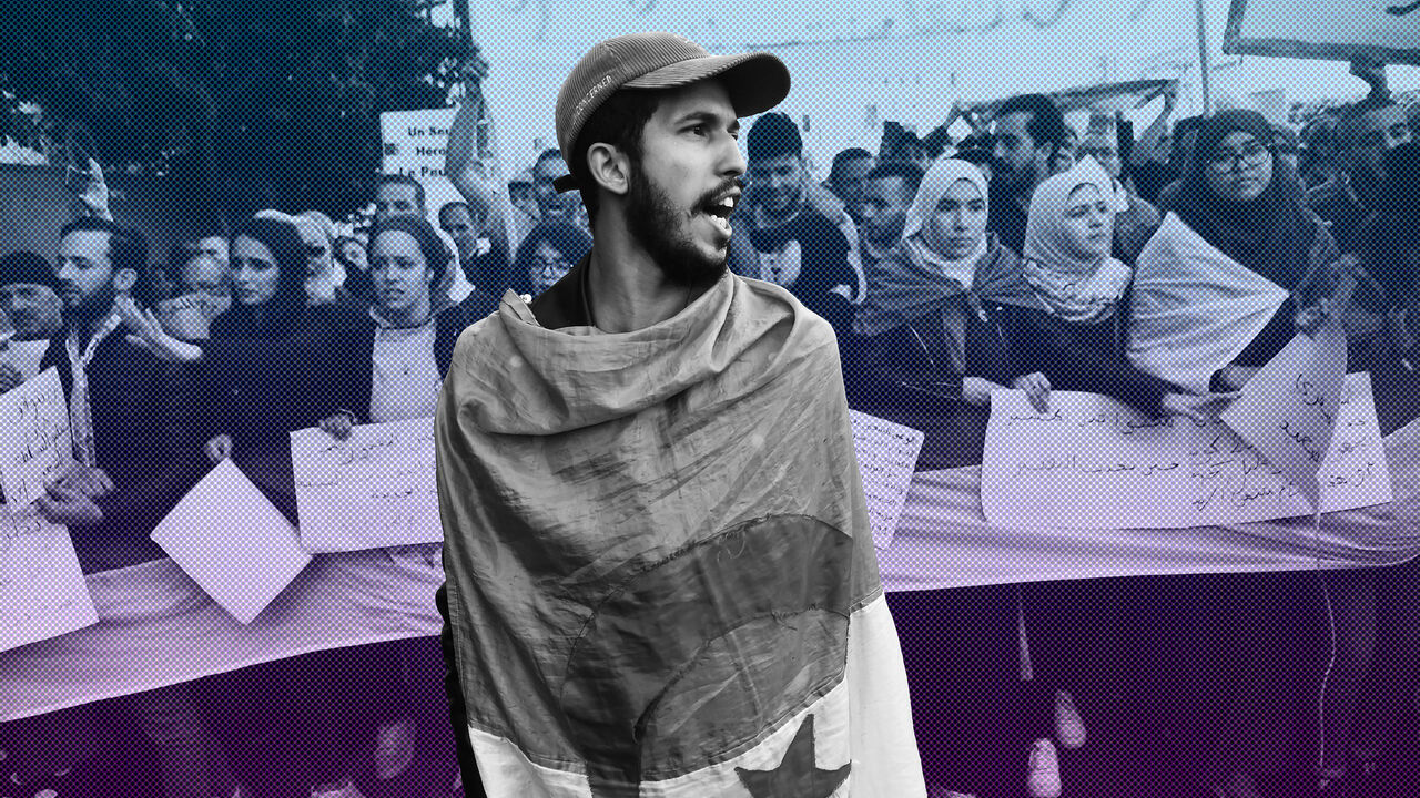 1201691238 Algerian students and other protesters take part in an anti-government demonstration in the capital Algiers, on February 18, 2020. - Anti-government protesters were back on the street for the 56th consecutive tuesday, ahead of the 1 year anniversary of the "Hirak", a months-long unprecedented reform movement calling for ending a system in place since the country's independence from France in 1962. (Photo by RYAD KRAMDI / AFP) (Photo by RYAD KRAMDI/AFP via Getty Images)
