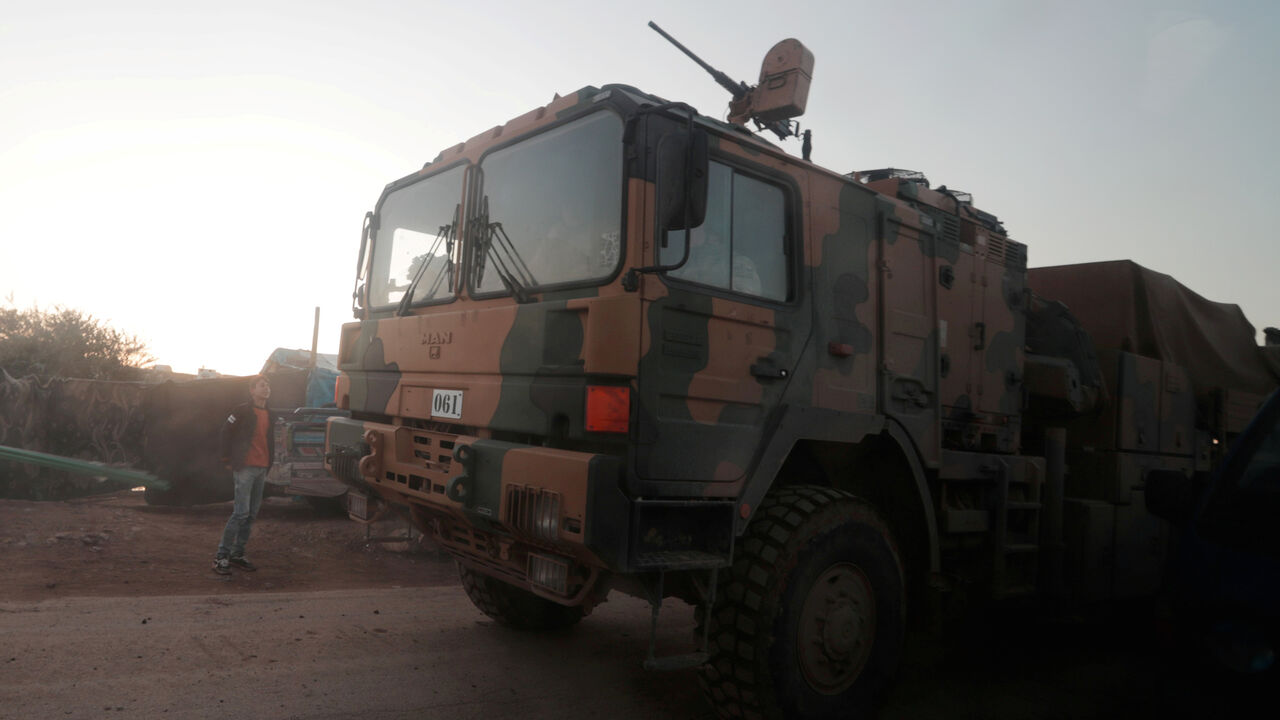 SYRIA-SECURITY/TURKEY Turkish military vehicles enter the Bab al-Hawa crossing at the Syrian-Turkish border, in Idlib governorate, Syria, February 9, 2020. REUTERS/Khalil Ashawi - RC2AXE9G6YVS
