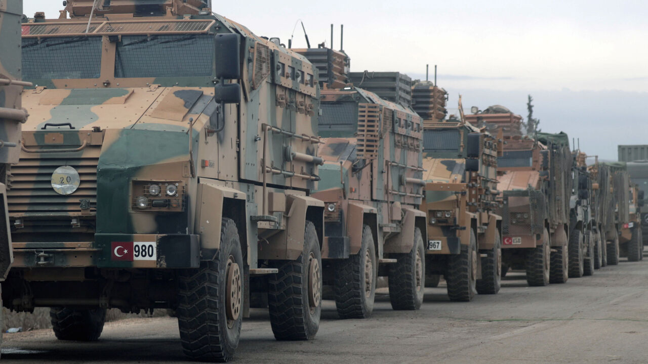 SYRIA-SECURITY/ Turkish military vehicles are seen in Hazano near Idlib, Syria, February 11, 2020. REUTERS/Khalil Ashawi - RC2HYE9JOB3E