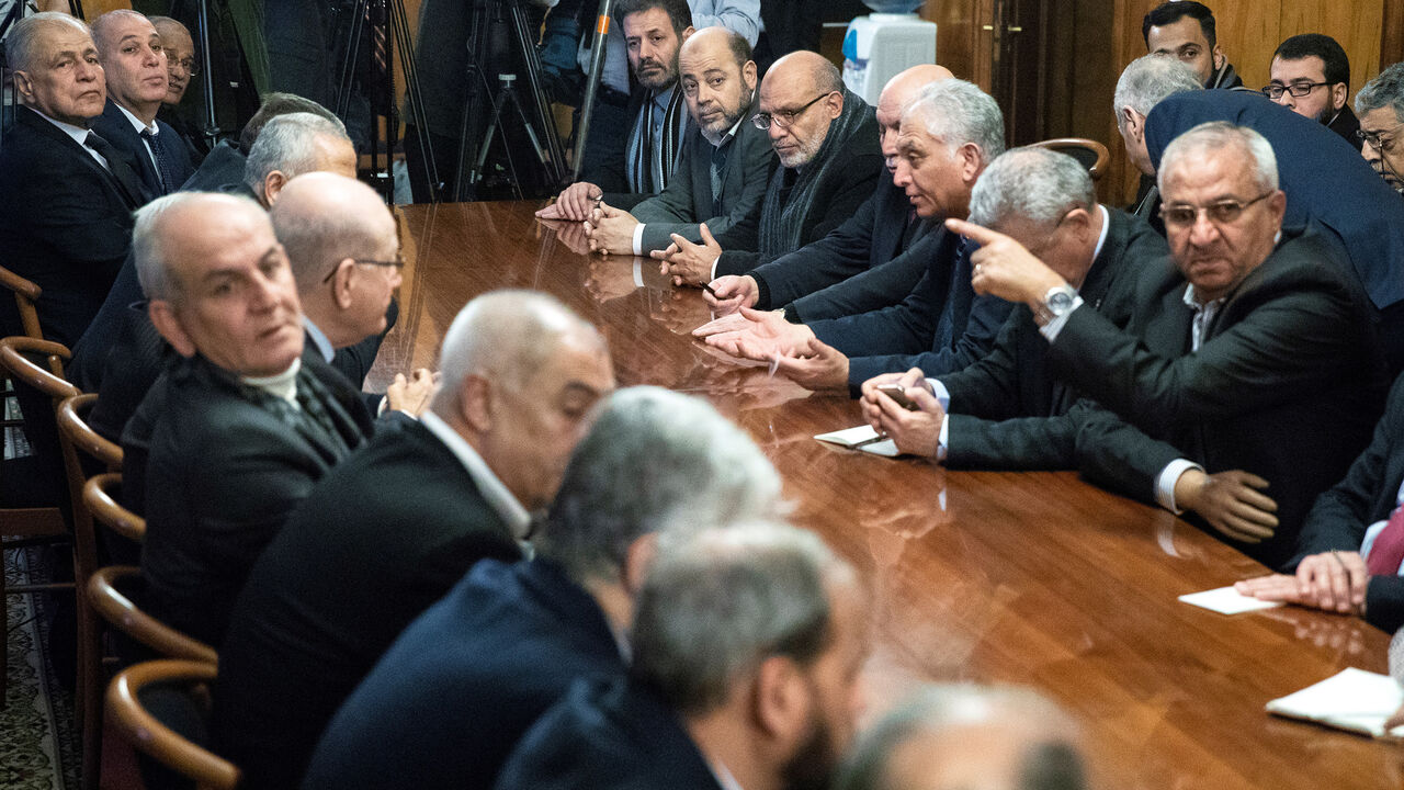 MIDEAST-CRISIS/RUSSIA Fatah and Hamas officials wait for a meeting with Russian Foreign Minister Sergei Lavrov and representatives of Palestinian groups and movements as a part of an intra-Palestinian talks in Moscow, Russia February 12, 2019. Pavel Golovkin/Pool via REUTERS - RC173B11DD10