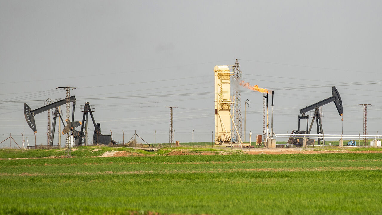 1206552755 Pump jacks operate in an oil field in the countryside of al-Qahtaniyah town in Syria's northeastern Hasakeh province near the Turkish border, on March 11, 2020. (Photo by Delil SOULEIMAN / AFP) (Photo by DELIL SOULEIMAN/AFP via Getty Images)